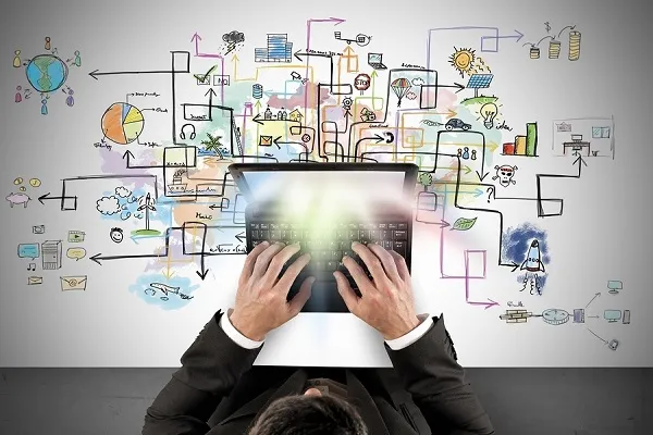 Businessman works with workflow diogram