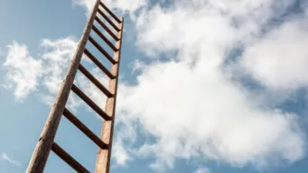 photo of the sky full of blue sky and a few white, fluffy clouds, and in the middle, there is a wooden ladder that disappears into the sky, indicating your options for the atlassian cloud migration are limitless.