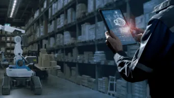Person in a warehouse using AI to interact and optimize inventory