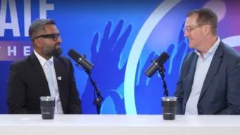 Screenshot from OpenStudio interview featuring Harals Adams with Ajit Yohannan.