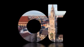 OpenText logo with skyline photo of Munich inside it