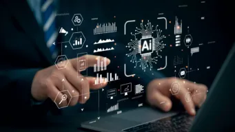 Man working at laptop, mid-shot, one hand is on keyboard and the other is pointing to AI icon floating above keys, referring to AI performance engineering and AI in performance testing.