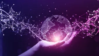 female's hand holding a digital world in her hand and an illustration of a digital supply chain orchestration strategy extends out from and around the globe.