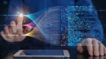 OpenText - man viewing data stream - Total Asset Visibility