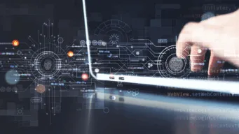 Image of someone using OpenText Identity Manager on a laptop.